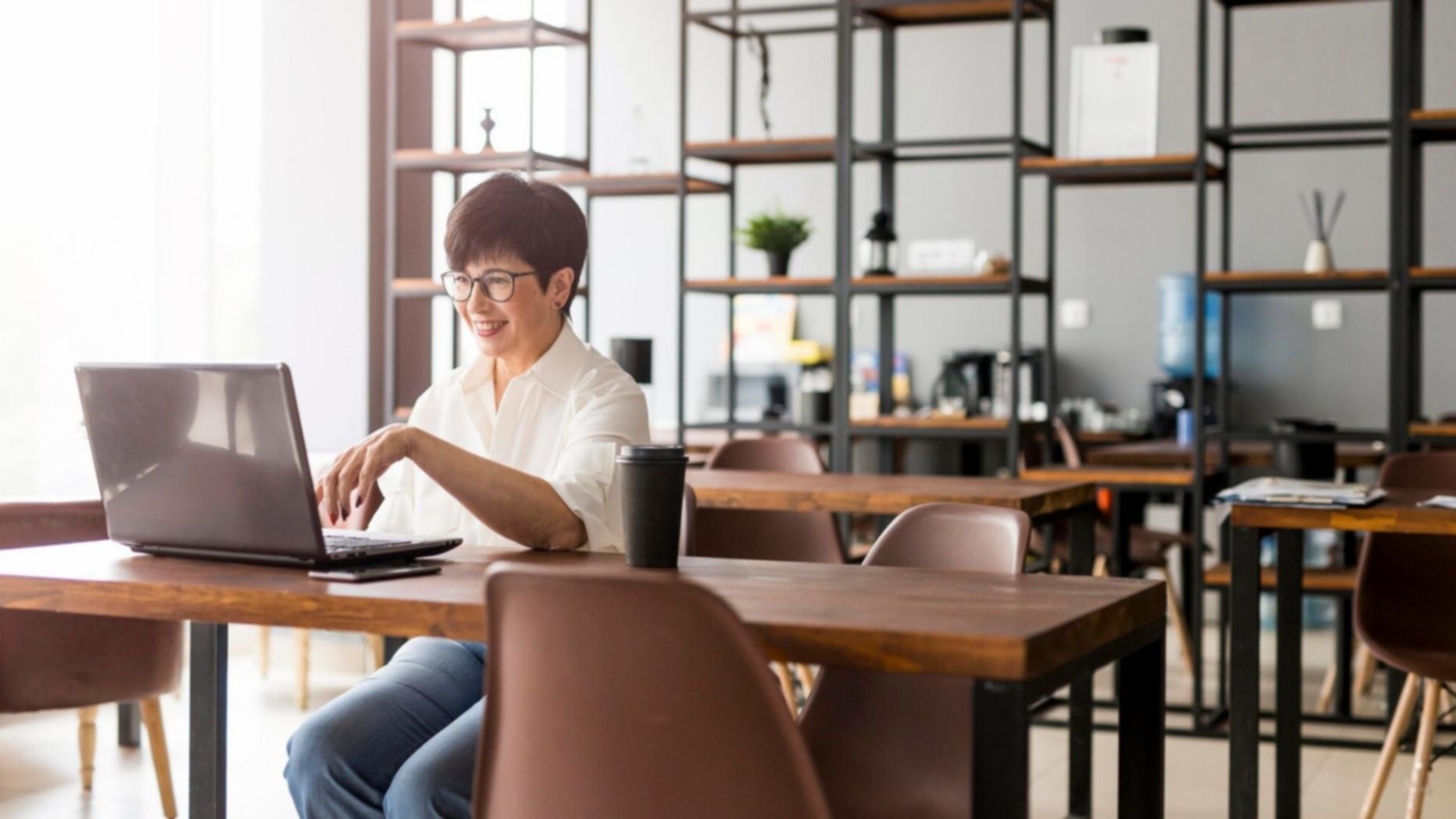 Professional reviewing financial documents and budget planning materials